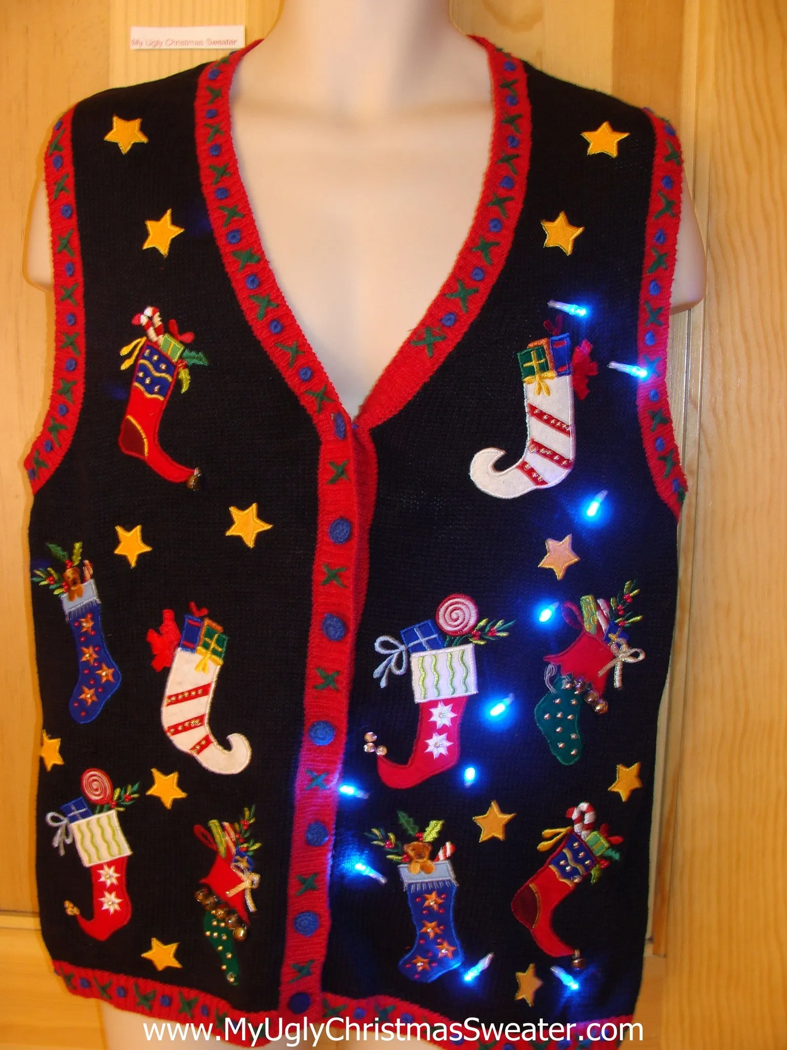 Tacky Christmas Sweater Vest with Horrible Pointy Stockings and Lights